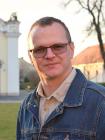 József
